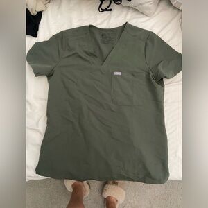 figs scrub top in moss